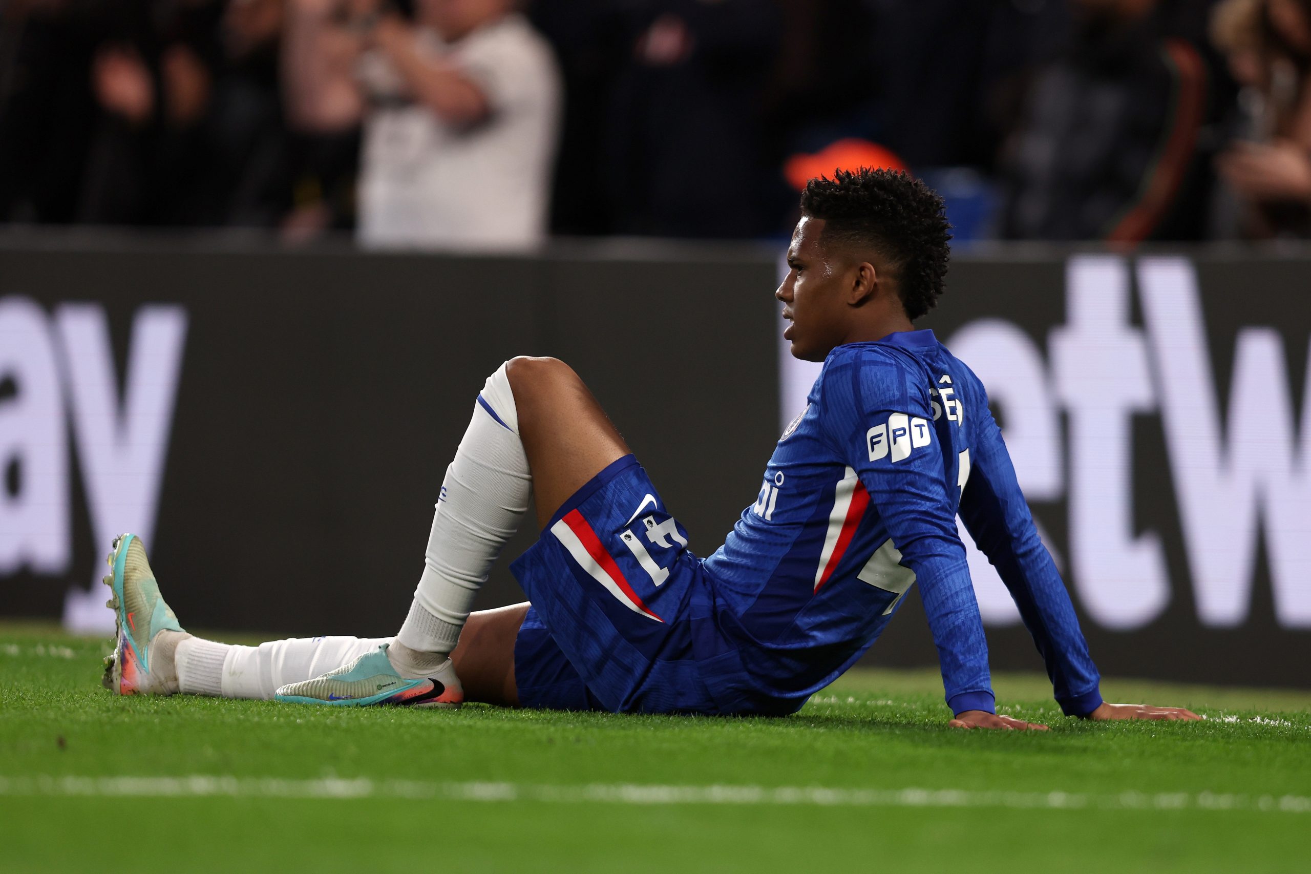 Estevao Willian of Chelsea goes down with injury during the Premier League match