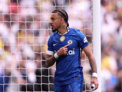 Malo Gusto touches the badge.