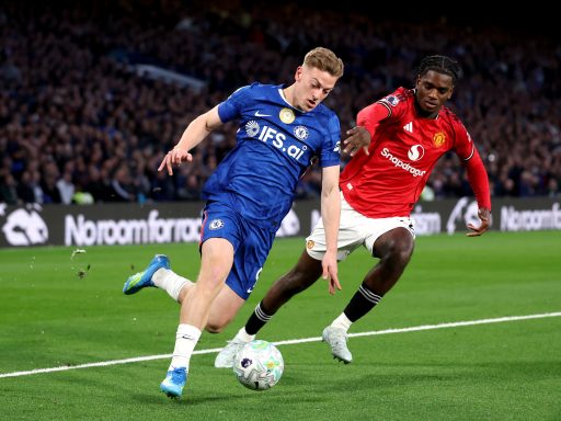 Liam Delap of Chelsea runs with the ball while under pressure