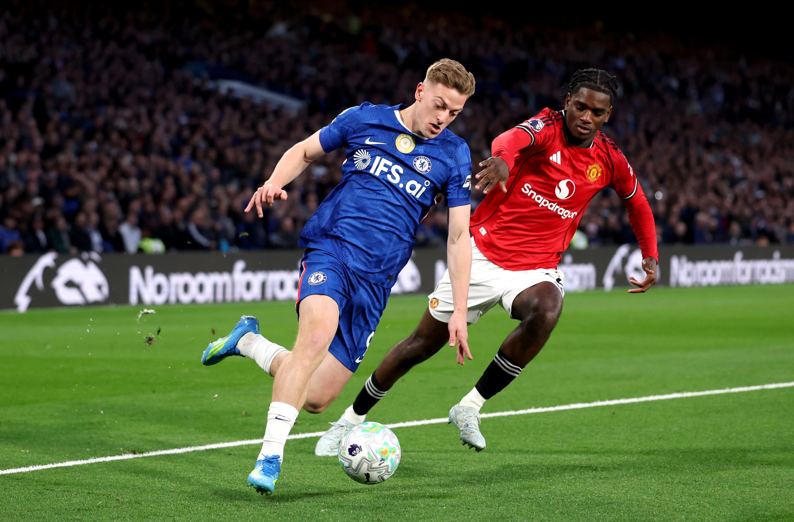 Liam Delap of Chelsea runs with the ball while under pressure Liam Delap of Chelsea runs with the ball while under pressure