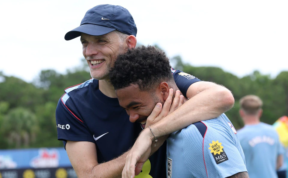 Reece James with Thomas Tuchel.