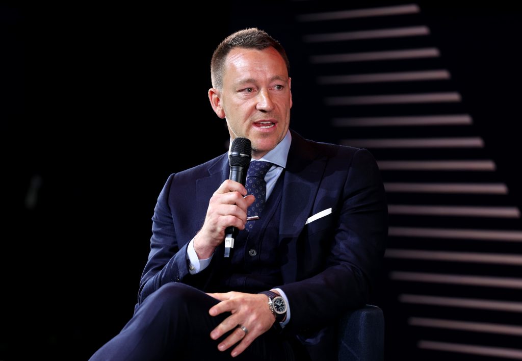 John Terry speaks at a forum.