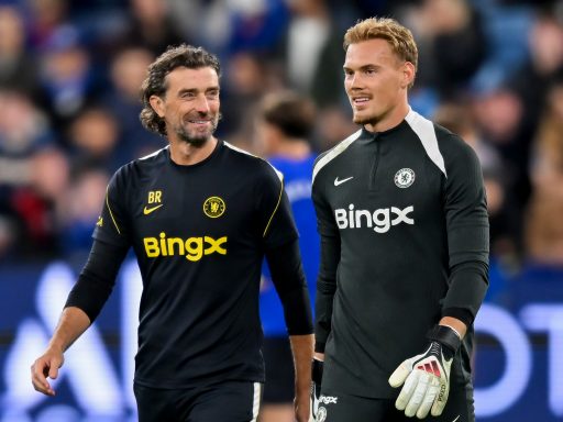 Goalkeeping Coach Ben Roberts of Chelsea FC talks to Filip Jorgensen of Chelsea FC during a Chelsea FC Open Training Session