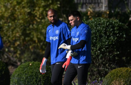 Robert Sanchez and Gabriel Slonina of Chelsea walk out during a Chelsea Training Session