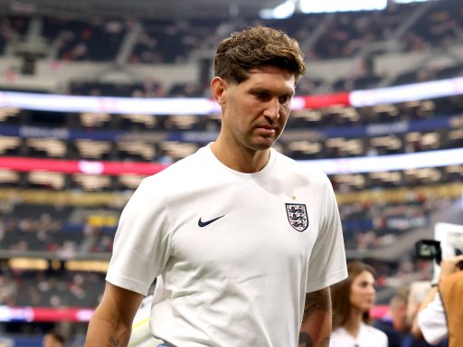 John Stones of England inspects the pitch before the FIFA World Cup 2026