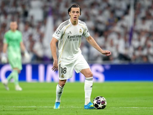 Alvaro Carreras of Real Madrid runs with the ball during the UEFA Champions League