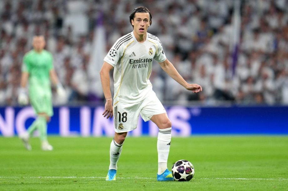 Alvaro Carreras of Real Madrid runs with the ball during the UEFA Champions League