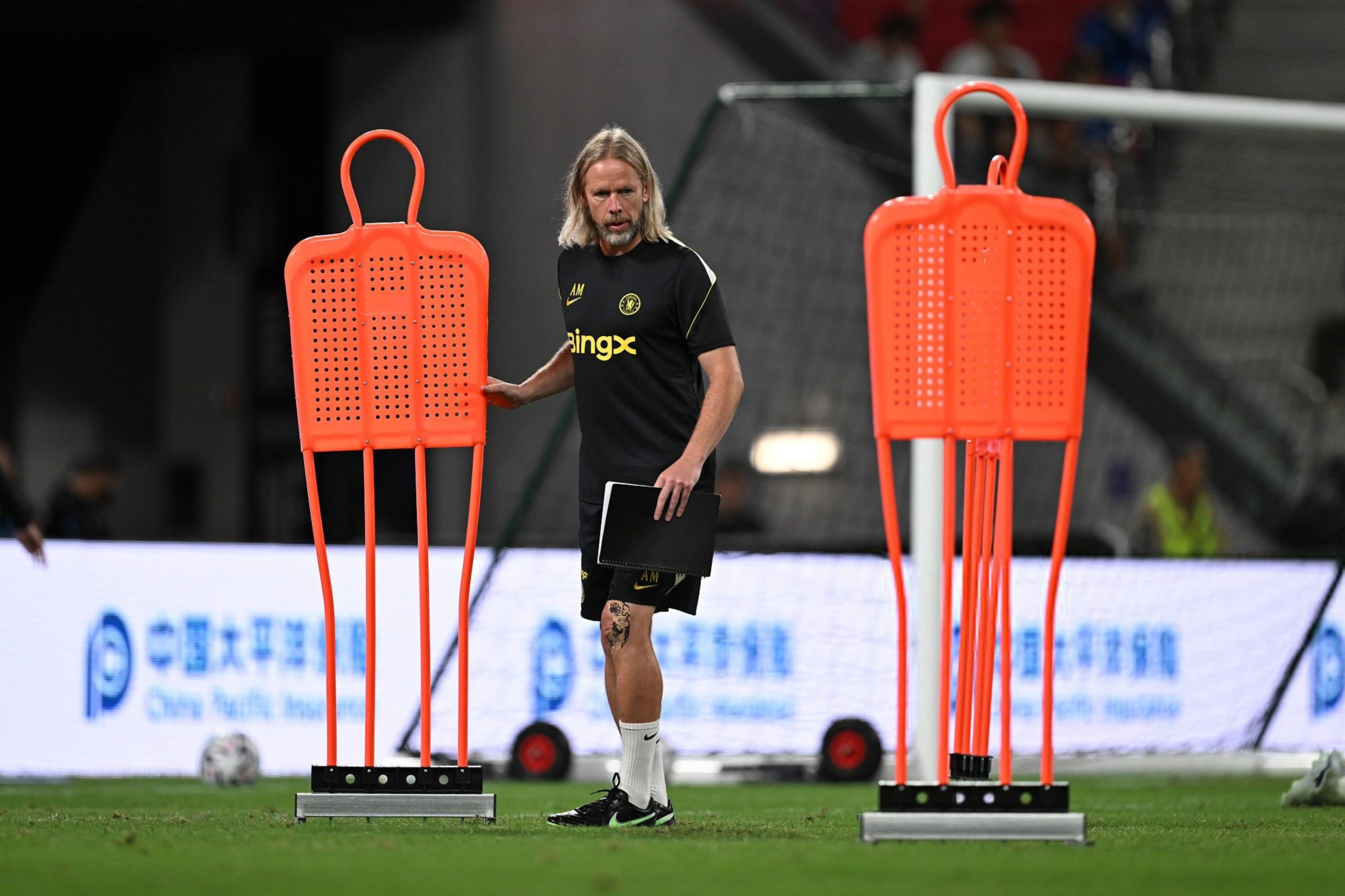 Austin Macphee sets up a training drill Austin Macphee sets up a training drill
