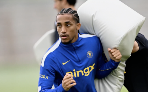Joao Pedro prepares with a rugby tackle bag
