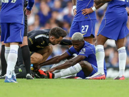 Moisés Caicedo of Chelsea goes down injured