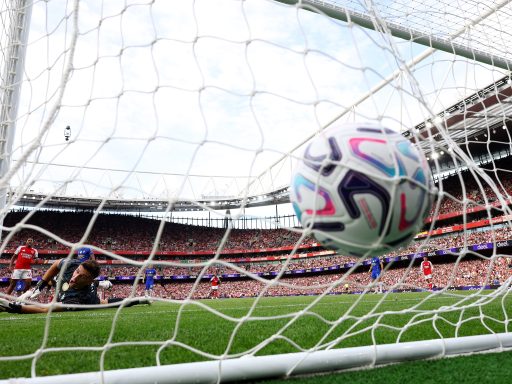 Kai Havertz of Arsenal scores his team’s first goal past Emiliano Martinez of Chelsea
