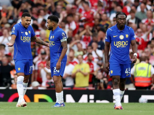 Morgan Rogers and Reece James of Chelsea react after Martin Odegaard of Arsenal scores
