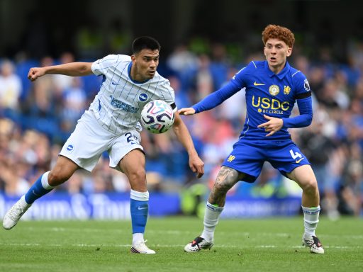 Diego Gomez of Brighton and Hove Albion is challenged by Valentin Barco of Chelsea