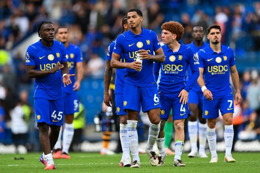 Chelsea players including Romeo Lavia, Levi Colwill and Valentin Barco look on