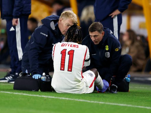 Jamie Gittens of England U21 is treated for an injury before being substituted during the UEFA U21 EURO 2027 Qualifier between England and Kazakhstan