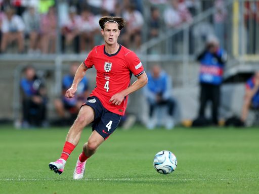 Alex Scott of England passes the ball